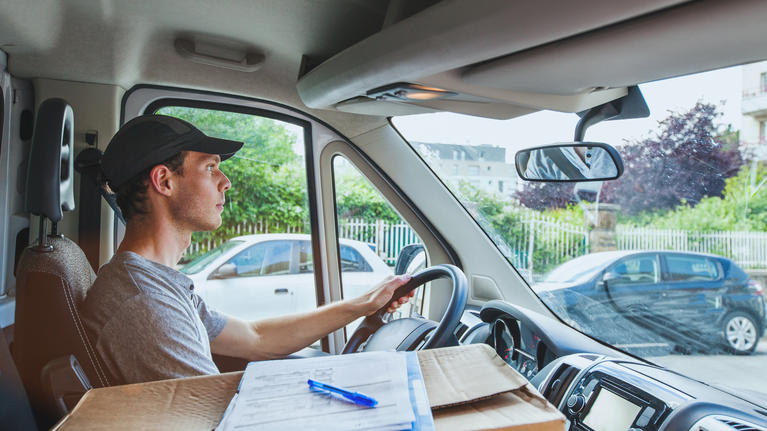 Delivery driver view of road and mirror